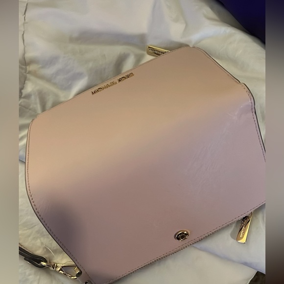 Michael Kors back with wristlet wallet